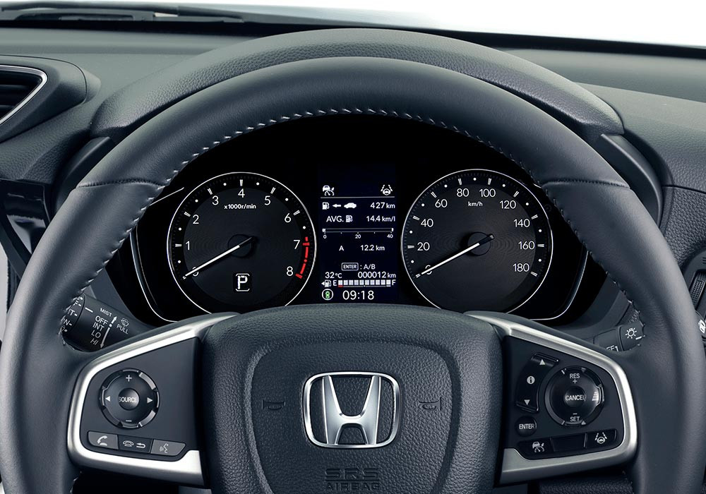 Leather - Wrapped Steering Wheel