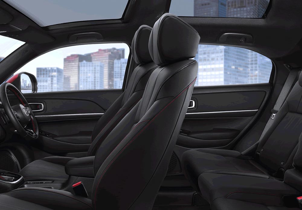 Stylish Black Interior and Leather-Trimmed Seat with Red Stitches