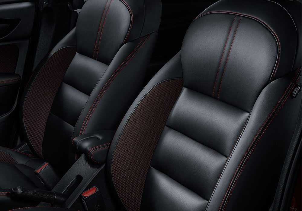 Leather Trimmed Seat With Red Stitches